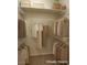 Spacious walk-in closet with organized shelving and hanging racks for ample storage at 10305 Snyder Ave, Las Vegas, NV 89134