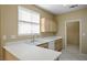 Well-lit kitchen with ample counter space and efficient layout at 10305 Snyder Ave, Las Vegas, NV 89134