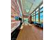 Grand lobby showcasing stone walls, wood floors, high ceilings, modern lighting, and comfortable seating areas at 10305 Snyder Ave, Las Vegas, NV 89134