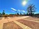 Outdoor shuffleboard court with multiple playing surfaces, perfect for leisurely afternoons at 10305 Snyder Ave, Las Vegas, NV 89134