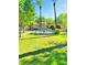 Beautiful water fountain with tiered design in a well-maintained green space with palm trees at 10305 Snyder Ave, Las Vegas, NV 89134
