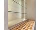 Custom shelving with wooden storage and ambient lighting at 11453 Glowing Sunset Ln, Las Vegas, NV 89135