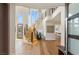 Grand entryway featuring a curved staircase, hardwood floors, and high ceilings at 11453 Glowing Sunset Ln, Las Vegas, NV 89135