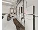 Garage featuring a car and Tesla Powerwall setup for energy storage at 11453 Glowing Sunset Ln, Las Vegas, NV 89135
