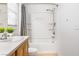 Bathroom featuring a shower-tub combo with white fixtures and modern finishes at 11894 Snow Bank St, Las Vegas, NV 89183
