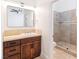 Bathroom with updated vanity and tiled walk-in shower at 1319 Red Baron Ln, Boulder City, NV 89005