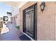Close-up of an ornate, secure front door with decorative details and a welcoming entrance at 1319 Red Baron Ln, Boulder City, NV 89005