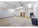 Expansive garage featuring ample space for parking and storage with sink at 1319 Red Baron Ln, Boulder City, NV 89005