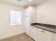 Cozy office space with built-in cabinets, granite countertops, and a window view at 1319 Red Baron Ln, Boulder City, NV 89005