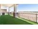 Spacious covered patio with faux grass and scenic desert views at 1319 Red Baron Ln, Boulder City, NV 89005