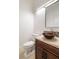 Stylish powder room featuring modern vessel sink and unique accent mirror at 1319 Red Baron Ln, Boulder City, NV 89005