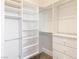 Walk-in closet featuring adjustable rods, shelving, and drawers at 1319 Red Baron Ln, Boulder City, NV 89005