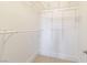 Walk-in closet equipped with adjustable shelving and a hanging rod at 1319 Red Baron Ln, Boulder City, NV 89005