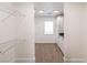 Organized walk-in closet with white wire shelving and storage cabinets at 1319 Red Baron Ln, Boulder City, NV 89005