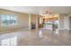 Spacious living room features tile flooring, fireplace and large windows offering views and natural light at 15 Via Mantova # 302, Henderson, NV 89011