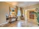 Elegant lobby area with tiled floors, a decorative mirror, and a seating area near the elevator at 15 Via Mantova # 302, Henderson, NV 89011