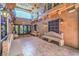 Lobby featuring ornate benches, stone floors, and decorative lighting fixtures at 15 Via Mantova # 302, Henderson, NV 89011