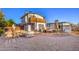 Large backyard showcasing a fire pit and outdoor living spaces perfect for entertaining at 1564 Vegas Valley Dr, Las Vegas, NV 89169