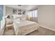 Relaxing bedroom featuring neutral decor, a plush bed, and soft natural light at 1564 Vegas Valley Dr, Las Vegas, NV 89169