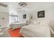 Comfortable bedroom with two beds, ample natural light, and stylish decor at 1564 Vegas Valley Dr, Las Vegas, NV 89169