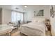 Bright bedroom featuring neutral decor, plush carpet, and soft natural light at 1564 Vegas Valley Dr, Las Vegas, NV 89169