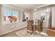 Dining room with large windows providing natural light and outdoor views at 1564 Vegas Valley Dr, Las Vegas, NV 89169