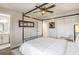 Bright main bedroom features a canopy bed, ceiling fan, closet and ensuite bathroom entrance at 1564 Vegas Valley Dr, Las Vegas, NV 89169