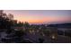 Serene backyard with a fenced perimeter showcasing a city view in the distance at 16 Mallard Creek Trl, Henderson, NV 89052