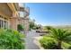 Picturesque backyard featuring a spiral staircase, lush greenery, and a serene outdoor retreat at 16 Mallard Creek Trl, Henderson, NV 89052