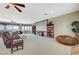 Large bonus room offers a home theater and picturesque views from the expansive windows at 16 Mallard Creek Trl, Henderson, NV 89052
