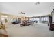 Expansive bonus room featuring media setup, lounging areas, and scenic views at 16 Mallard Creek Trl, Henderson, NV 89052