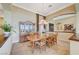 Elegant dining room boasts a large wood table set and beautiful built-in china cabinet at 16 Mallard Creek Trl, Henderson, NV 89052