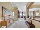 Welcoming foyer with neutral tones, elegant decor, and seamless transitions to living spaces at 16 Mallard Creek Trl, Henderson, NV 89052