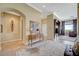 Elegant foyer with neutral color scheme and seamless transitions to adjacent living spaces at 16 Mallard Creek Trl, Henderson, NV 89052