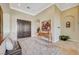 Grand foyer featuring high ceilings, double doors, and elegant decor at 16 Mallard Creek Trl, Henderson, NV 89052