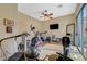 Home gym with an array of equipment and a ceiling fan at 16 Mallard Creek Trl, Henderson, NV 89052