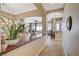 Inviting hallway leading to a living room and bar area at 16 Mallard Creek Trl, Henderson, NV 89052