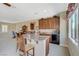Kitchenette includes a granite countertop and stainless steel mini-fridge at 16 Mallard Creek Trl, Henderson, NV 89052