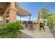 Outdoor kitchen bar on a covered patio offering great views and shaded seating at 16 Mallard Creek Trl, Henderson, NV 89052