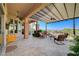 Expansive patio boasting lounge seating, a spiral staircase, and panoramic views at 16 Mallard Creek Trl, Henderson, NV 89052