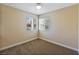 Cozy bedroom with plush carpet, neutral paint, and bright, natural light at 1836 N Decatur Blvd # 203, Las Vegas, NV 89108