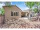 Well maintained home backyard with covered patio and desert landscaping at 2279 Keego Harbor St, Henderson, NV 89052
