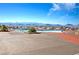 Resort-style community pool area with ample seating and stunning mountain views, ideal for relaxation at 2279 Keego Harbor St, Henderson, NV 89052