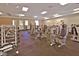 Spacious gym featuring modern weight machines, free weights, and large windows for natural light at 2279 Keego Harbor St, Henderson, NV 89052