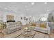 Spacious living room with recessed lighting, neutral decor, and open floor plan at 2279 Keego Harbor St, Henderson, NV 89052