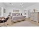 Main bedroom provides natural light, modern decor and hardwood flooring at 2279 Keego Harbor St, Henderson, NV 89052