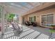 Outdoor living space with a shaded patio and lounge furniture for relaxing and entertaining at 2279 Keego Harbor St, Henderson, NV 89052