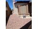 Backyard featuring low-maintenance landscaping with decorative gravel and a covered porch area at 2362 Sierra Sunrise St, Las Vegas, NV 89156