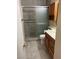 The bathroom includes a sliding glass door shower, tile floors, and wood vanity at 2362 Sierra Sunrise St, Las Vegas, NV 89156