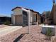 Charming single-story home with a terracotta tile roof and desert landscaping for easy maintenance at 2362 Sierra Sunrise St, Las Vegas, NV 89156